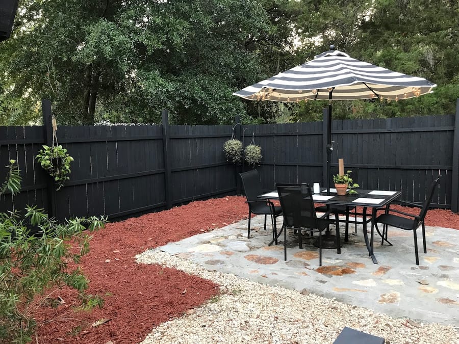 Finished flagstone patio with red mulch &amp; white gravel