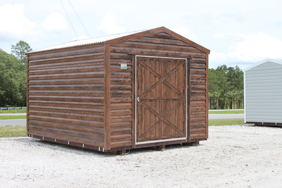 Aluminum shed with rustic paneling and metal roof