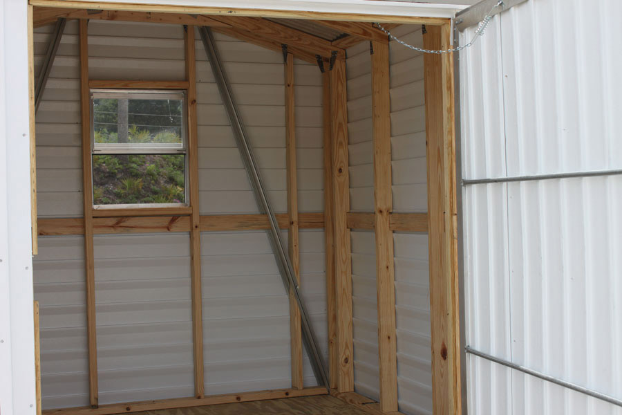 Interior of an aluminum storage shed with window